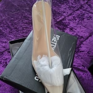 Women clear high heel pumps